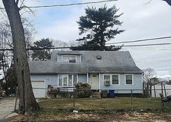 Pre-foreclosure in  SPRUCE ST Brentwood, NY 11717