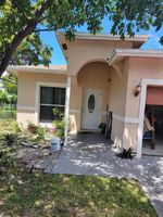 Pre-foreclosure in  NW 2ND ST Pompano Beach, FL 33069