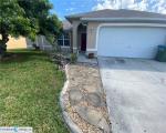 Pre-foreclosure in  NW 9TH TER Cape Coral, FL 33993