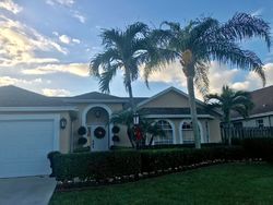 Pre-foreclosure in  MEADOWBREEZE DR West Palm Beach, FL 33414