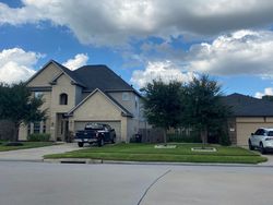 Pre-foreclosure in  WHISPERING GREEN DR Cypress, TX 77429