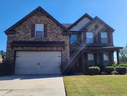 Pre-foreclosure in  TROPHY CLUB AVE Dacula, GA 30019