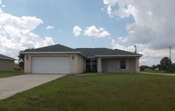 Pre-foreclosure in  NE 18TH TER Cape Coral, FL 33909