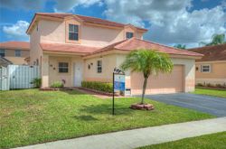 Pre-foreclosure in  NW 22ND ST Hollywood, FL 33029