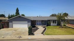 Pre-foreclosure in  PINE ST Hughson, CA 95326