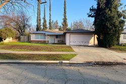 Pre-foreclosure in  W ALAMOS AVE Fresno, CA 93722