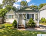 Pre-foreclosure in  PEARL AVE Holtsville, NY 11742