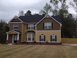 Pre-foreclosure in  WOODGATE HILL TRL Snellville, GA 30039