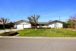 Pre-foreclosure in  N BRIARWOOD AVE Fresno, CA 93711