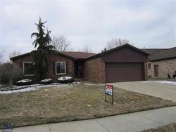 Pre-foreclosure in  MEADOWBROOK DR Macomb, MI 48044