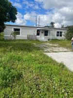 Pre-foreclosure in  NW 28TH WAY Fort Lauderdale, FL 33311