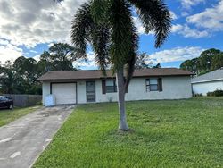 Pre-foreclosure in  SW CURRY ST Port Saint Lucie, FL 34983