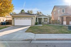 Pre-foreclosure in  E HARWOOD AVE Fresno, CA 93727