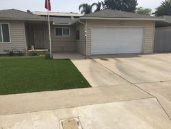 Pre-foreclosure in  N RICEWOOD AVE Fresno, CA 93705