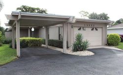 Pre-foreclosure in  WHISPERING LAKES LN Palm Beach Gardens, FL 33418