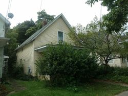 Pre-foreclosure in  W BARNES AVE Lansing, MI 48910