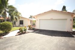 Pre-foreclosure in  NW 82ND WAY Pompano Beach, FL 33065