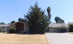 Pre-foreclosure in  E HAZELWOOD DR Lemoore, CA 93245