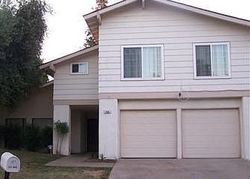 Pre-foreclosure in  W PORTLAND AVE Fresno, CA 93711