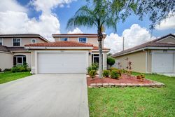 Pre-foreclosure in  SPRINGFIELD LAKE DR Lake Worth, FL 33467