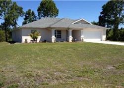 Pre-foreclosure in  PADDOCK ST Lehigh Acres, FL 33974