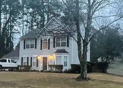 Pre-foreclosure in  WOODMORE DR SW Marietta, GA 30008