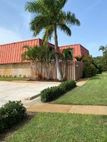 Pre-foreclosure in  MERIDIAN WAY N APT B Palm Beach Gardens, FL 33410