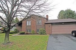Pre-foreclosure in  WOODSMOKE LN Rochester, NY 14612