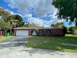 Pre-foreclosure in  NW 24TH CT Fort Lauderdale, FL 33322