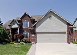 Pre-foreclosure in  OLD BROOK LN Macomb, MI 48044