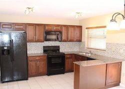 Pre-foreclosure in  NW 122ND TER Hollywood, FL 33026