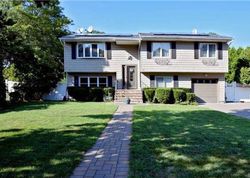 Pre-foreclosure in  WOODBROOK DR Ridge, NY 11961