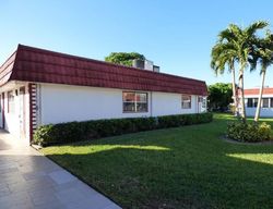 Pre-foreclosure in  WATERFORD D Delray Beach, FL 33446