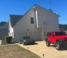 Pre-foreclosure in  DESHON CREEK DR Lithonia, GA 30058