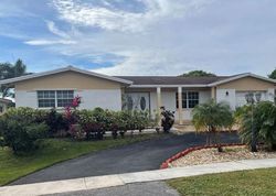 Pre-foreclosure in  NW 13TH CT Hollywood, FL 33026