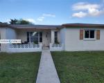 Pre-foreclosure in  NW 77TH AVE Pompano Beach, FL 33063