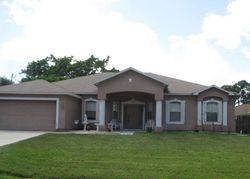 Pre-foreclosure in  SW AGNES ST Port Saint Lucie, FL 34953