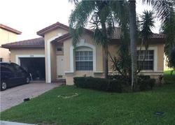 Pre-foreclosure in  NW 62ND LN Pompano Beach, FL 33067