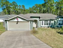 Pre-foreclosure in  UNISON CT Palm Coast, FL 32164