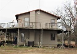 Pre-foreclosure in  REVIS HILL RD Mountainburg, AR 72946