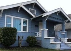 Pre-foreclosure in  YAKIMA AVE Tacoma, WA 98408