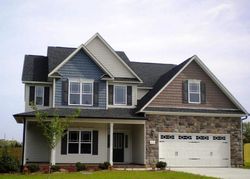 Pre-foreclosure in  WOOD VALLEY DR Four Oaks, NC 27524
