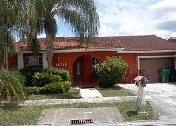 Pre-foreclosure in  NW 10TH LN Miami, FL 33182