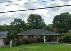 Pre-foreclosure in  MANSLICK RD Louisville, KY 40214