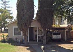 Pre-foreclosure in  W MAPLE AVE Tulare, CA 93274