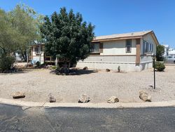 Pre-foreclosure in  W APRICOT DR Tucson, AZ 85741