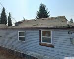 Pre-foreclosure in  MCKINLEY AVE Tacoma, WA 98404