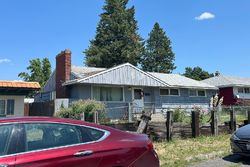 Pre-foreclosure in  W LONGFELLOW AVE Spokane, WA 99205