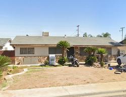Pre-foreclosure in  E OLIVE WAY Dinuba, CA 93618