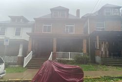 Pre-foreclosure in  E MCINTYRE AVE Pittsburgh, PA 15214